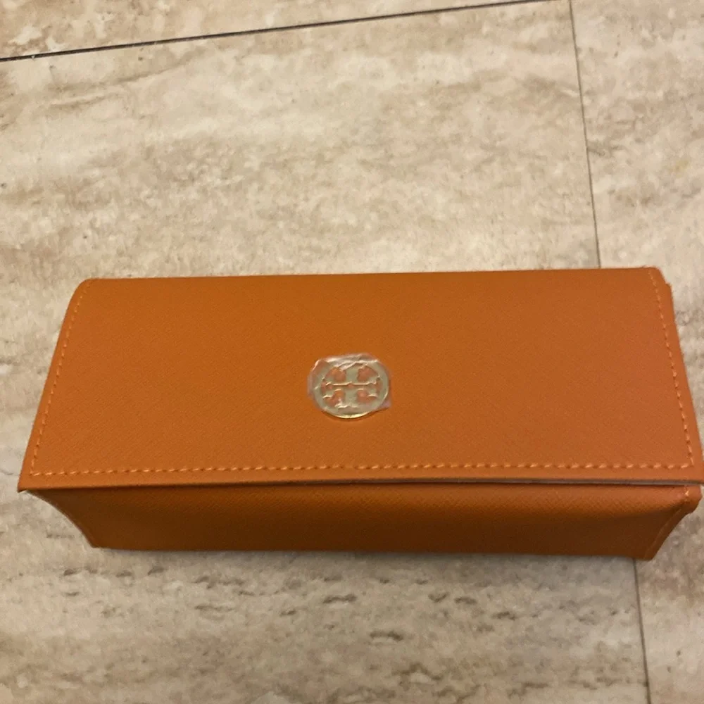 Tory Burch “Cranberry” sunglasses - New with case and dust bag.